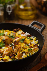 Biryani with chicken. Traditional Indian dish of rice and chicken marinated in spices and yoghurt.