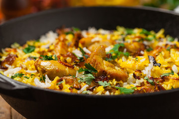 Biryani with chicken. Traditional Indian dish of rice and chicken marinated in spices and yoghurt.