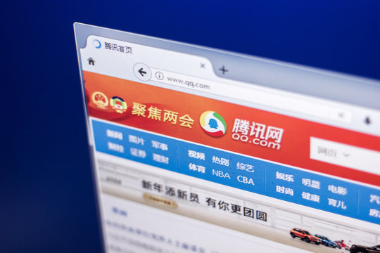Ryazan, Russia - March 01, 2018 - Homepage of popular in China instant messaging service QQ.COM on the display of PC.