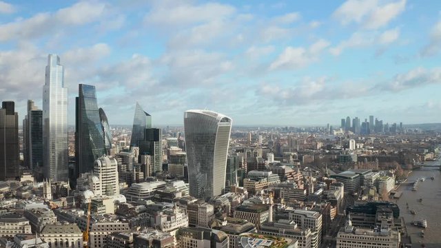 London city centre aerial panorama view: financial district, Thames river, Belfast, skyscrappers, warf and buildings and St. Pauls Cathedral, Tower Bridge and The Tower