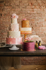 An example of three beautiful wedding cakes from a pastry chef. Elegant and unusual design with...