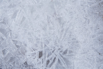  ice texture with a pattern of snowflakes and crystals close-up. Abstract winter background.