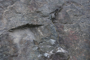 The texture of natural mountain stone. Colored stone texture. Background, pattern, banner.