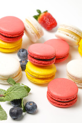 colorful macaroons on white background