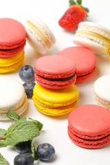 colorful macaroons on white background
