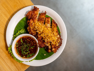 Fried chicken with gaelic and jaew sauce