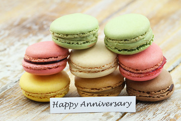Happy anniversary card with a stack of colorful, crunchy, sweet macaroons