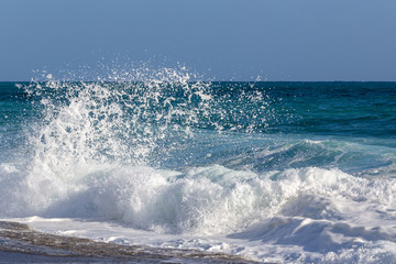 Sea wave during sunny weather after the storm. Stormy sea background.