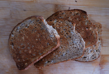 Sliced Toasted brown bread on a chopping board