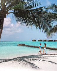 couple in maldives luxury resort