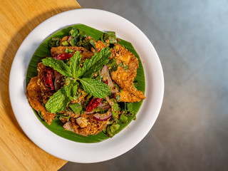 Spicy minced grilled catfish salad