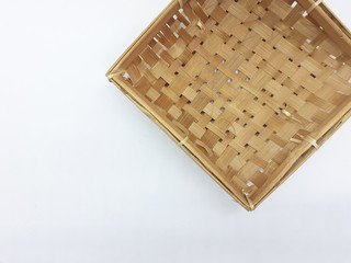 Traditional Ethnic Artistic Brown Wooden Handmade Bamboo Rattan Basket Container Tray for Home Interiors Decoration in White Isolated Background