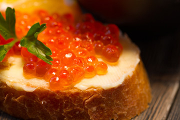 Red caviar sandwich with butter.