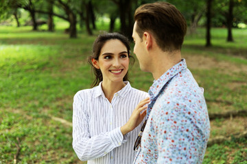Obraz premium Young Couples traveling and walking in holiday at garden for relaxation time.