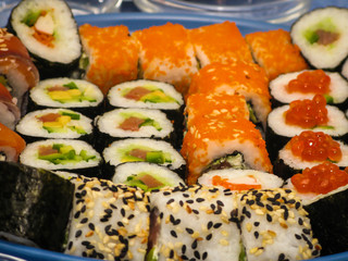 plate with various kinds and types of sushi