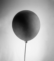 black balloon on a gray background