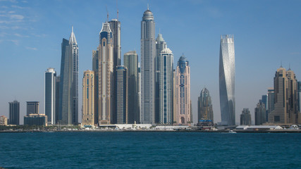 Fototapeta na wymiar view of the beach and skyscrapers from the promenade of the artificial island Palm Jumeirah, Dubai, UAE