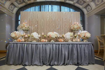 Luxury, elegant wedding reception table arrangement, floral centerpiece