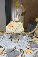 The luxury, elegant wedding reception table arrangement.