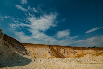 Marl quarry for the extraction of raw materials for the production of cement. Industrial landscape.