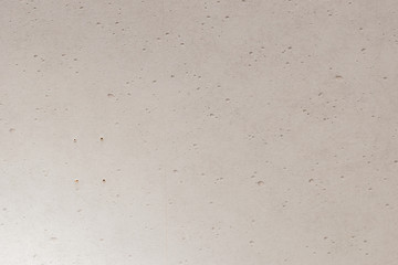 Cement wall has a surface in the building.