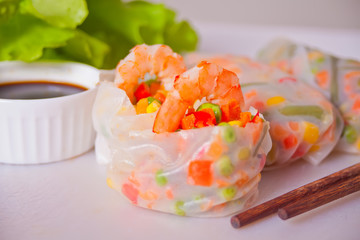 Spring rolls with vegetables and shrimps in rice paper