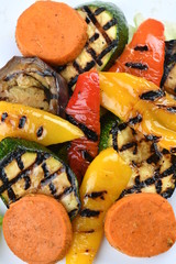 Grilled vegetables, sweet potato, zucchini, eggplant, pepper. Bright, juicy, macro.