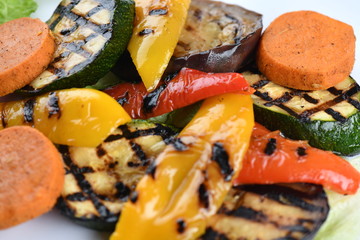 Grilled vegetables, sweet potato, zucchini, eggplant, pepper. Bright, juicy, macro.