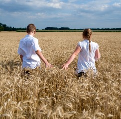  girl and boy in grain