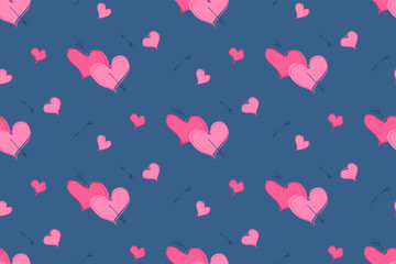 Red and pink hearts on blue background. Valentines Day seamless pattern.