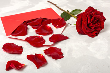 Composition of red roses and gift boxes