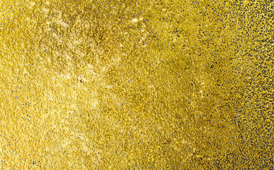 Gold texture with scratches. Surface of golden brass plate background