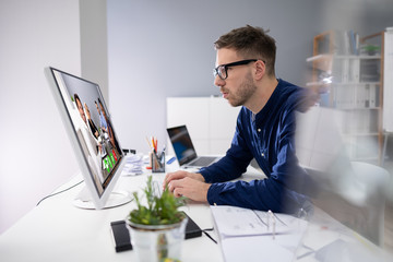 Businessman Video Conferencing Desktop Computer