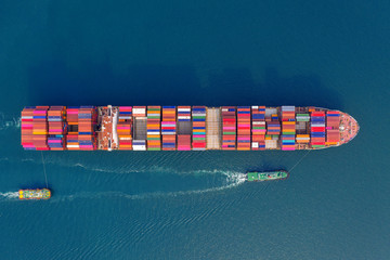 Aerial view of container cargo ship in sea. © tawatchai1990