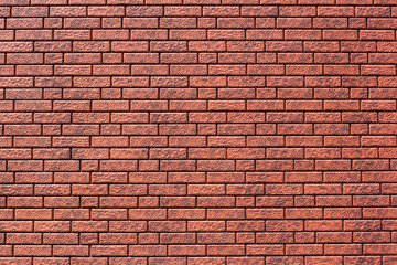 Red brick background. Orange, brown brick. Loft style, grunge, retro, vintage. Stone wall.