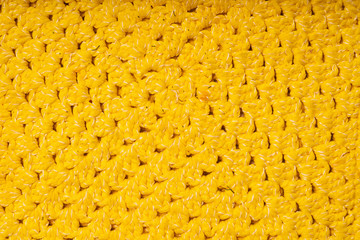 Knitted coaster lace napkin, macro shooting. Structural member, flat position