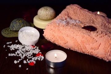 Valentine's day in Spa style. dark the table on which two white hearts from of salt for baths removed under 45 degrees. selective focus