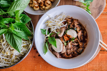 Noodle and meatball in blood soup selling at street market in Thailand