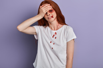sad young girl has headache as she is being worried about her life problems, woman has a bump under...
