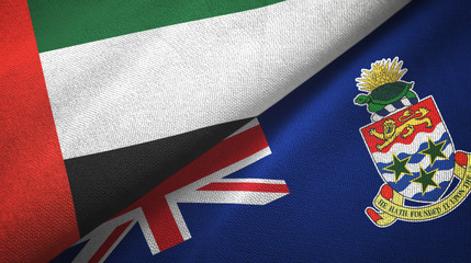 United Arab Emirates and Cayman Islands two flags textile cloth, fabric texture