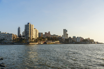 Fototapeta na wymiar View of skyline on coast from Haji Ali Dargah in Mumbai. India