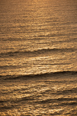 Reflect of the Sunset of summer over sea in Miraflores town, in Lima, Peru.