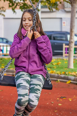 Little girl playing in park