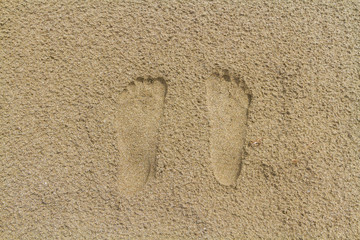 Fu&szlig;abdr&uuml;cke im Sand