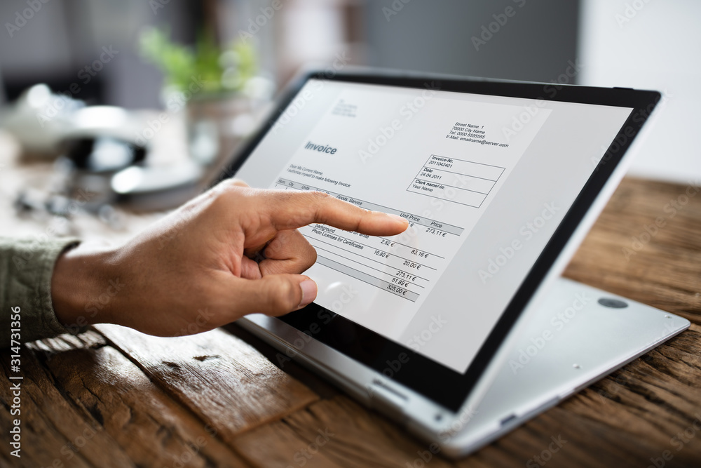 Sticker Businessman's Hands Working On Invoice On Laptop