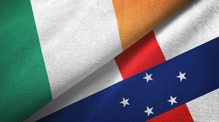 Ireland and Netherlands Antilles two flags textile cloth, fabric texture