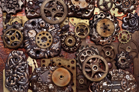 Composition of many brass gears of various sizes. Steampunk background.