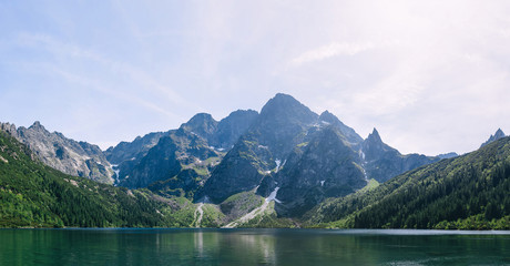 Fototapeta na wymiar Amazing nature, lake in the mountains, summer landscape with blu