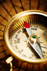 Vintage compass isolated on white background