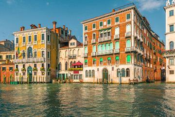 Beautiful view on colorful building facades standing along the Grand canal, Venice, Italy
